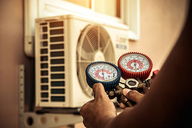 Professional Hvac technician working in Carver, MA